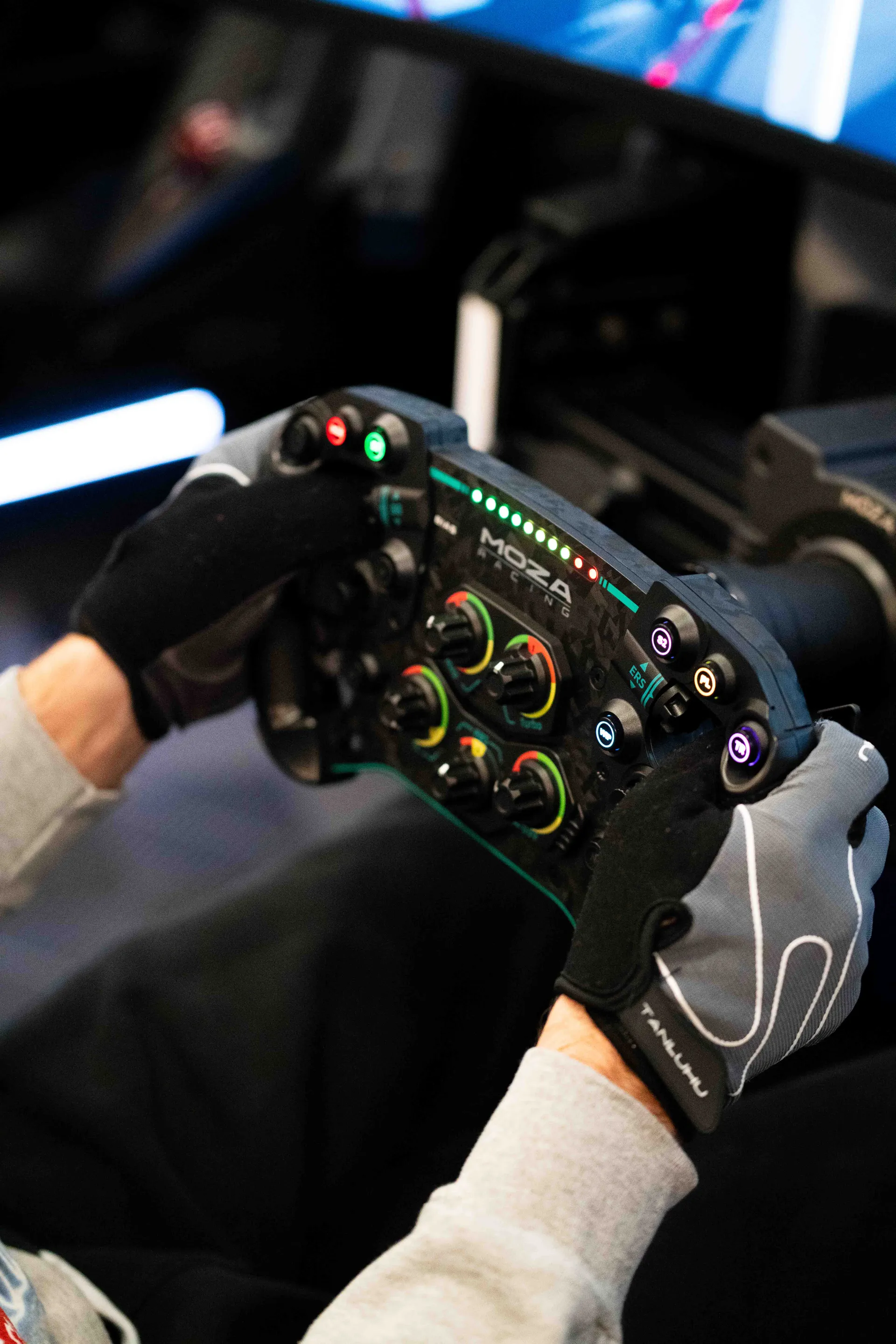 Driver experiencing their first lap at a racing simulator at Grid Lounge sim racing lounge Cedar Falls
