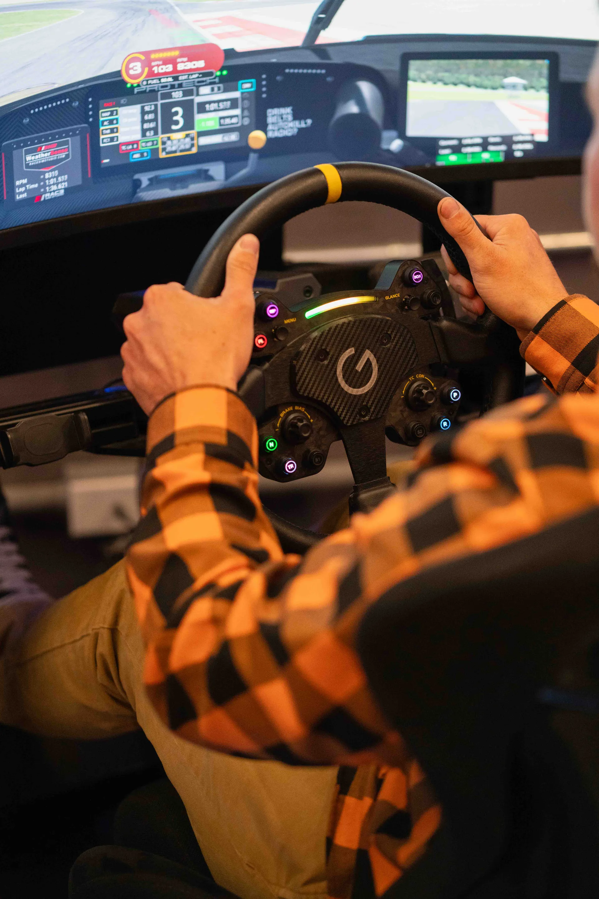 Race under the Grid Lounge banner.