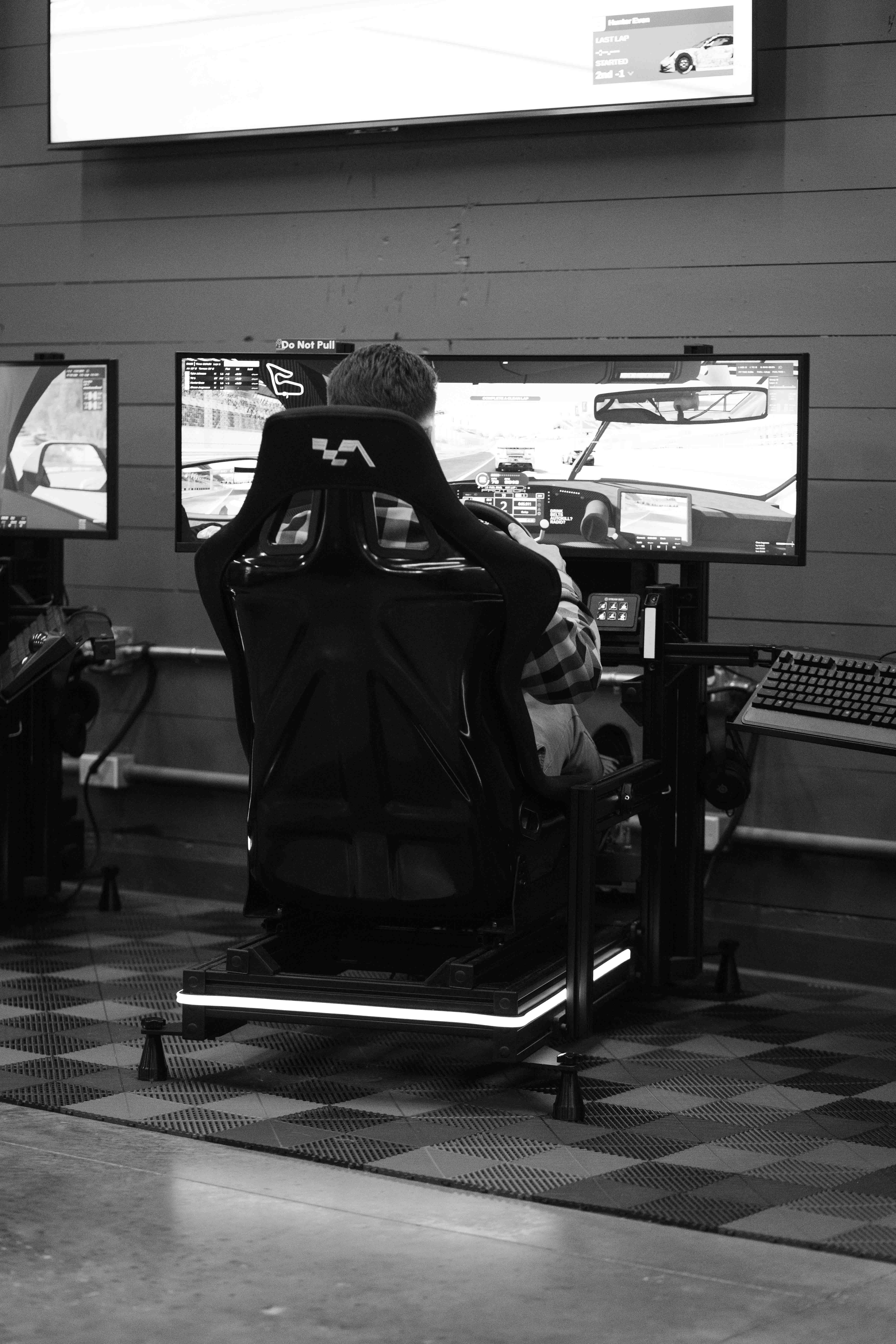 Driver focused at the wheel competing at Grid Lounge Cedar Falls