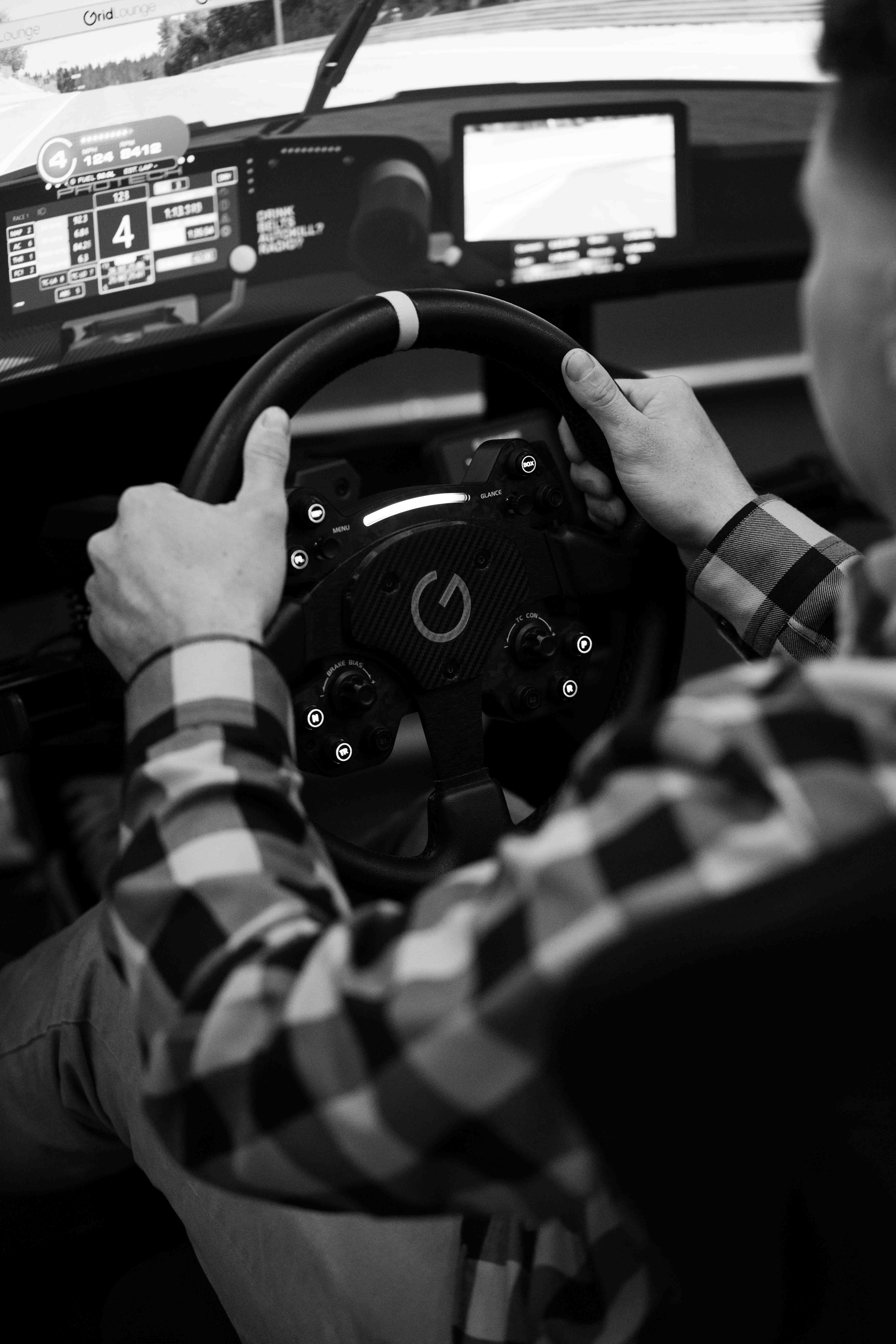 Sim racing action at Grid Lounge Cedar Falls Iowa