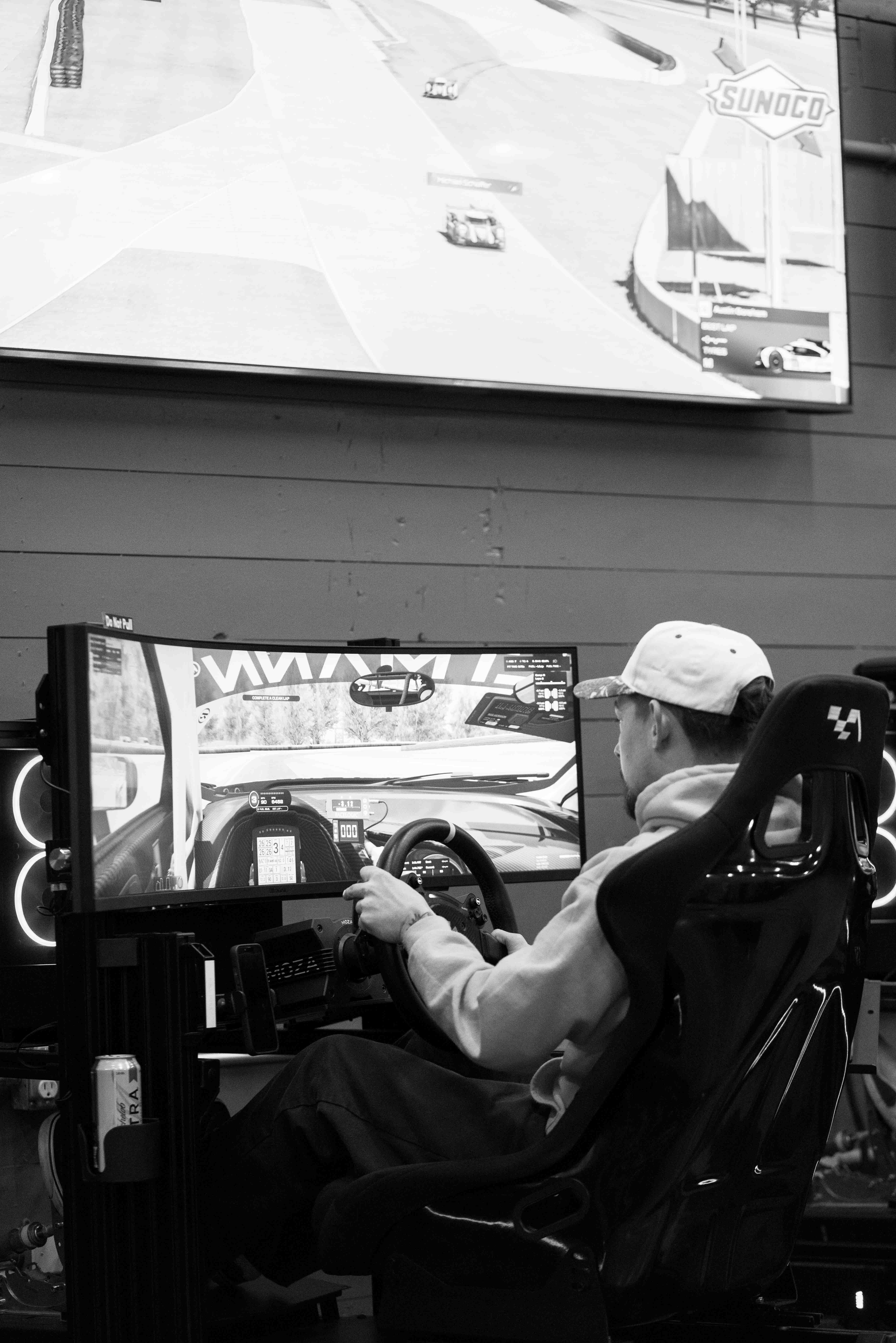 Driver focused at the wheel at Grid Lounge Cedar Falls